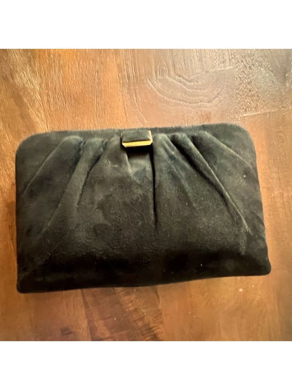 Lisette suede evening clutch gold trim, closure and edging.
